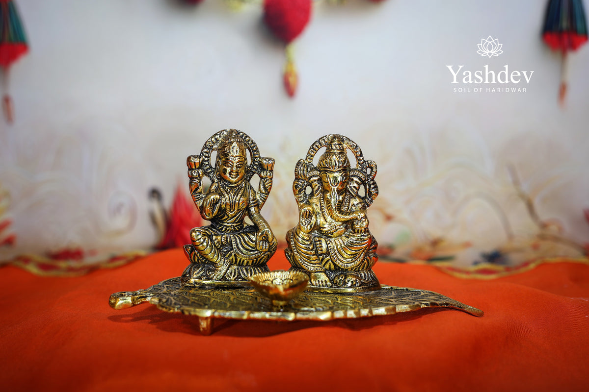 Lakshmi Ganesh Idol on Leaf with Diya – Antique Gold Finish
