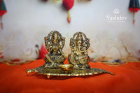 Lakshmi Ganesh Idol on Leaf with Diya – Antique Gold Finish